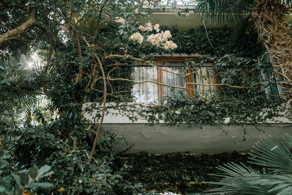 Lush vertical garden on apartment balcony
